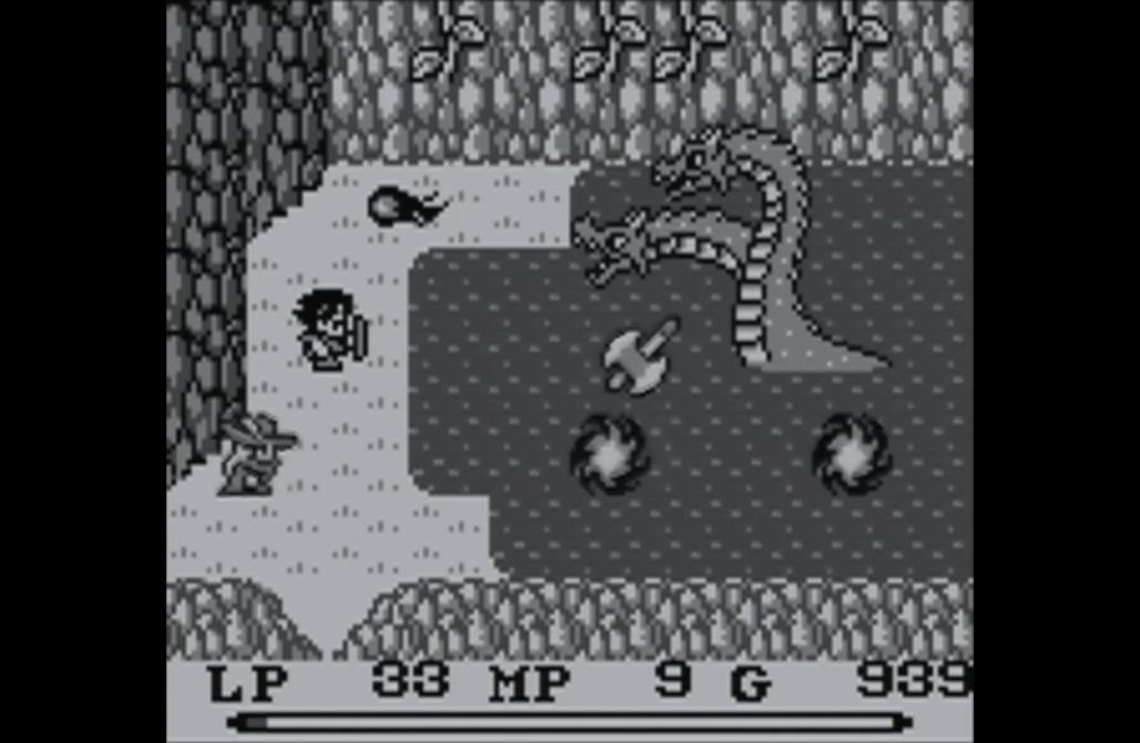 Ein junger Ritter und ein alter Zauberer kämpfen gegen eine zweiköpfige Hydra: "Mystic Quest"-Screenshot.